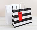 Shopping Bag With Red Tag Stock Photo