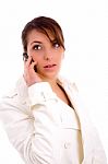 Side Pose Of Fashionable Woman Talking On Cellphone Stock Photo