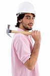 Side View Of Architect With Hammer Stock Photo