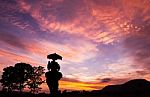 Silhouette Elephant With Tourist At Sunset Stock Photo