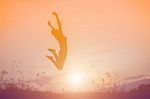 Silhouette Picture Of A Woman Plays Yoga Stock Photo