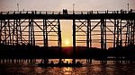 Silhouetted Bridge At Sunset Stock Photo