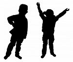 Silhouettes Of Two Little Boys Stock Photo