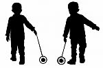 Silhouettes Of Two Little Boys Stock Photo