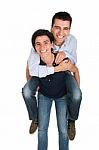 Sister Gives Piggyback Stock Photo