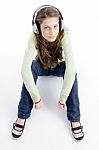 Sitting Female Listening Music Stock Photo