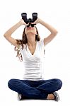 Sitting Girl  Looking Through Binocular Stock Photo