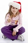 Sitting Girl Showing Thumb Up Stock Photo