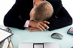 Sleeping Businessman At His Desk Stock Photo