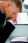 Sleeping Employee at his desk Stock Photo