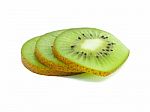 Slice Of Fresh Juicy Delicious And Healthy Kiwi Fruit, Isolated Stock Photo