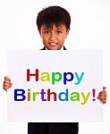 Small Boy With Happy Birthday Board Stock Photo