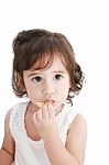 Small Child Eating Crisps Stock Photo