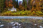 Small Church On A River Side In Autumn Stock Photo