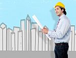 Smart Architect Holding Blueprint Map Stock Photo