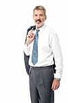 Smart Businessman In A Relaxed Pose Stock Photo