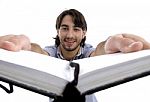 Smart Guy Holding His Opened Diary Stock Photo