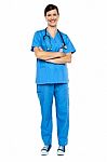 Smart Looking Female Doctor, Arms Folded Stock Photo