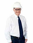 Smiling Aged Engineer With Hard Hat Stock Photo