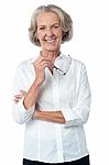 Smiling Aged Woman Looking At You Stock Photo