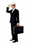 Smiling Architect Holding Briefcase Stock Photo