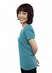 Smiling Asian Woman Standing Stock Photo