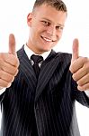 Smiling Boss Showing Thumb Up Stock Photo