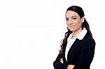 Smiling Business Woman With Folded Arms Stock Photo