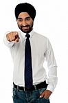 Smiling Businessman Pointing Towards You Stock Photo