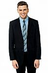 Smiling Businessman Posing Casually Stock Photo