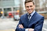 Smiling Businessman Posing For The Camera Stock Photo