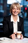 Smiling Businesswoman Having Coffee, Outdoor Stock Photo