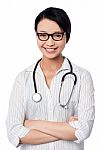 Smiling Confident Female Doctor Stock Photo