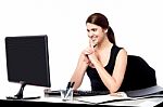 Smiling Corporate Lady In Her Office Stock Photo