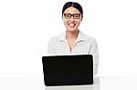 Smiling Corporate Lady With Laptop Stock Photo