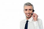 Smiling Customer Support Executive Stock Photo