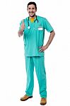 Smiling Doctor Showing Thumbs Up Stock Photo