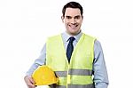 Smiling Engineer With Safety Helmet Stock Photo