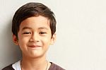 Smiling Face Of Asian Young Boy Stock Photo