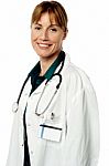 Smiling Female Doctor At Work Stock Photo