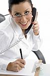 Smiling Female Doctor With Phone Stock Photo