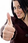 Smiling Female Showing Thumbs Up Stock Photo