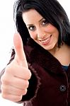 Smiling Female Showing Thumbs Up Stock Photo