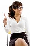 Smiling Female showing Thumbs Up Stock Photo