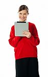 Smiling Girl Using Tablet Pc Stock Photo