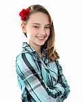 Smiling Girl wearing rose On Head Stock Photo