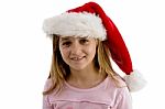 Smiling Girl Wearing Santa Hat Stock Photo