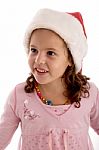 Smiling Girl Wearing Santa Hat Stock Photo