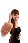 Smiling Gorgeous Model Showing Thumb Up Stock Photo