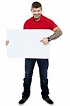 Smiling Guy Pointing Blank Board Stock Photo